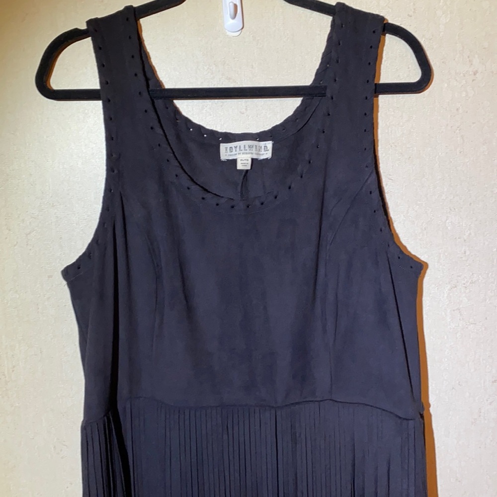 Black faux suede fringe dress NEW NEVER WORN, no tags . Super comfy looks great